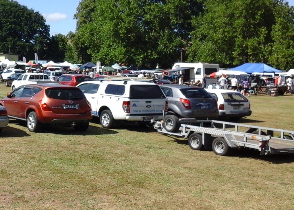 Cars parked in field in Morrinsville.