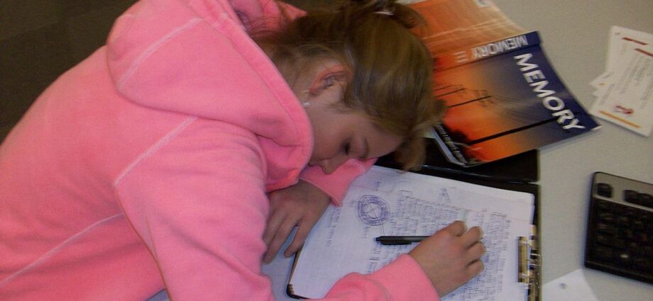Teenager Sleeping While Studying